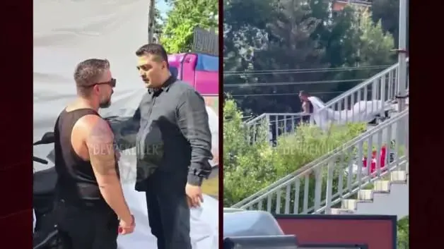 Cumhurbaşkanı'nın afişini sökerken yakalanan şahsa belediye çalışanları müdahale etti