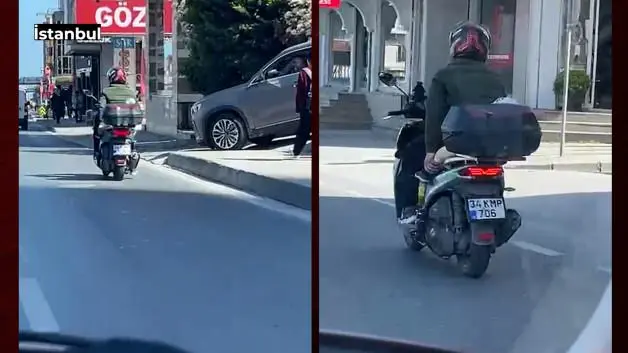 E-5’te skandal görüntü: Bebeği motosiklete lastikle bağlayıp trafiğe çıktı