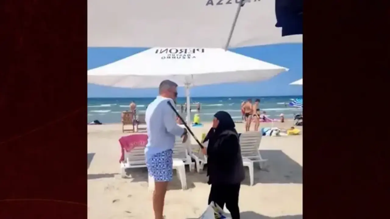 Plajda yaşlı teyzenin bastonuyla görevliyi kovaladığı anlar gündem oldu