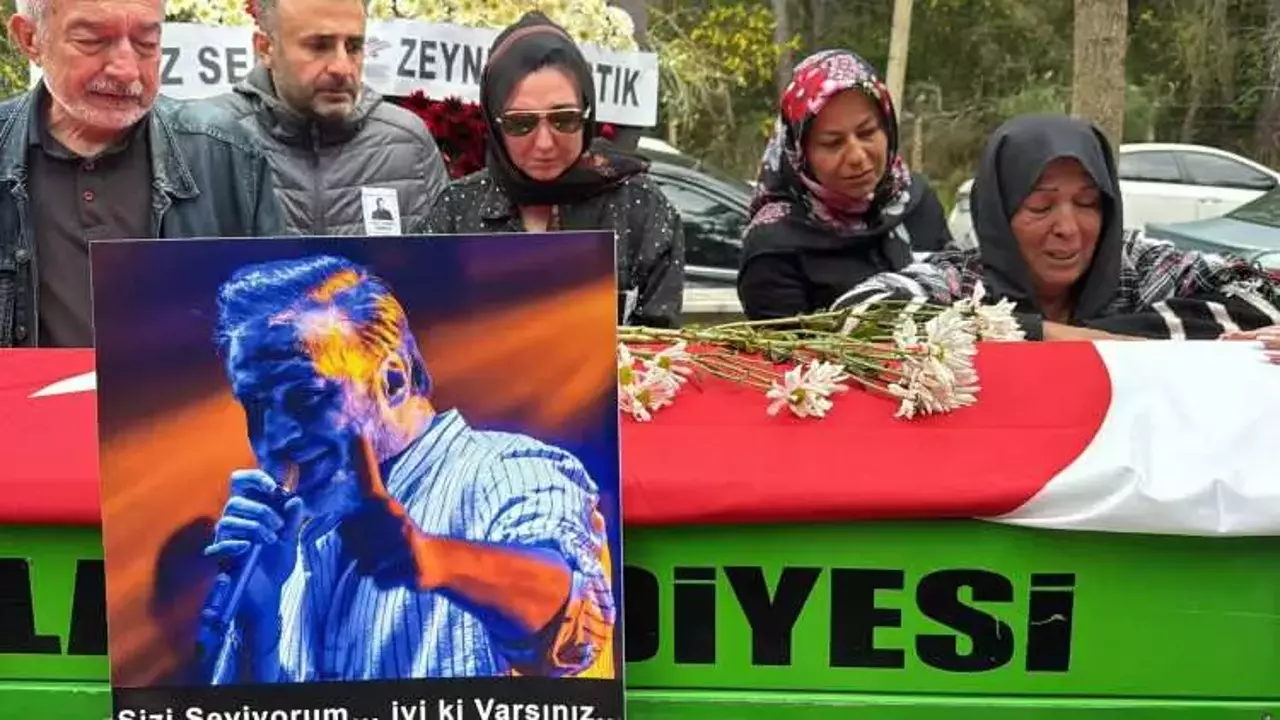 Rıza Tamer'in cenazesinde gözyaşları sel oldu: Son yolculuğuna gitarıyla uğurlandı